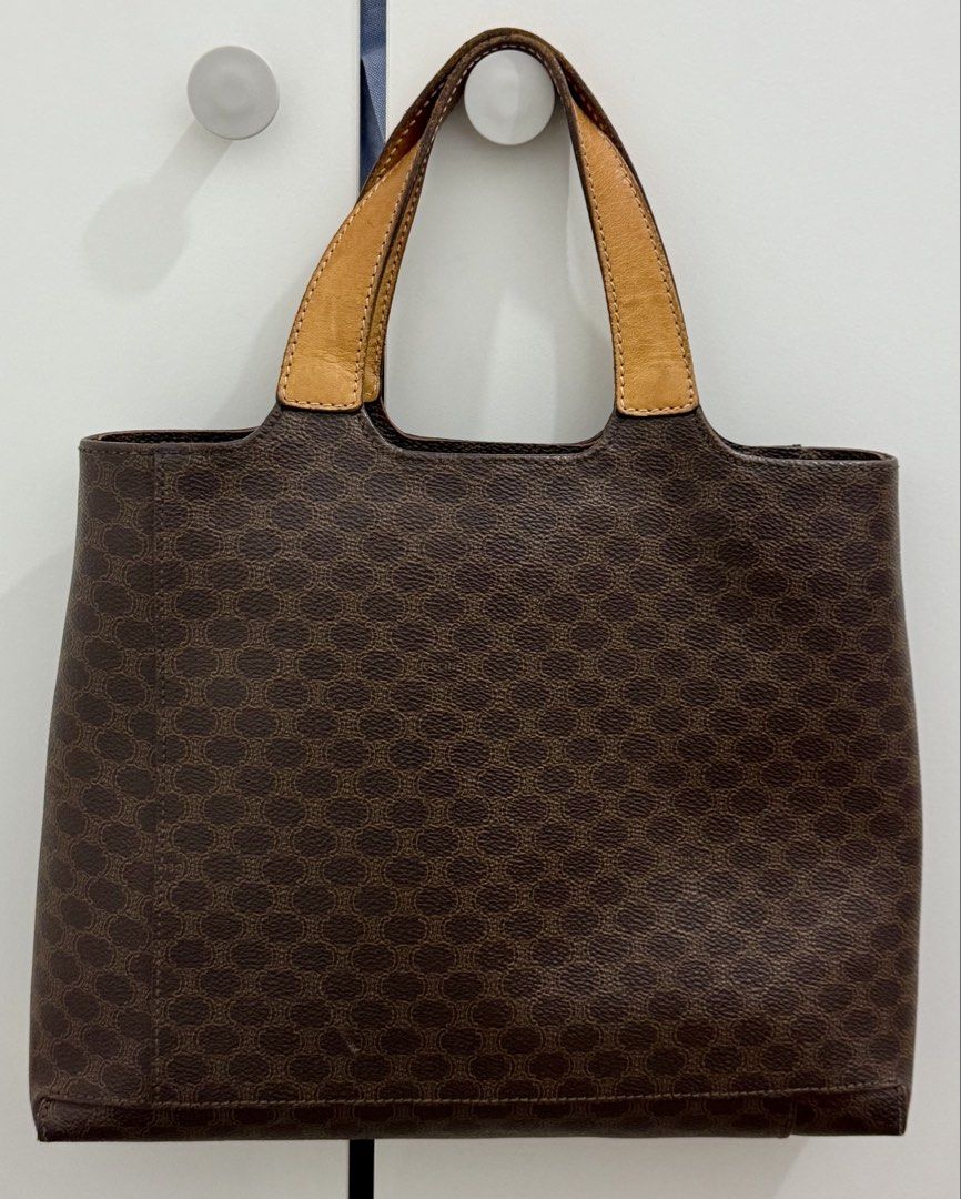 Vintage Celine Macadam Tote Bag (Category: Luxury Bags & Wallets) located in Cavite. Submitted by edendardar07 (Listing ID 1449958836, Image 2). Description: - Classic Celine tote bag - Iconic monogram print - Leather trim and handles - Zipper closure - Interior tag: CE00/15 - Ideal for everyday essentials.