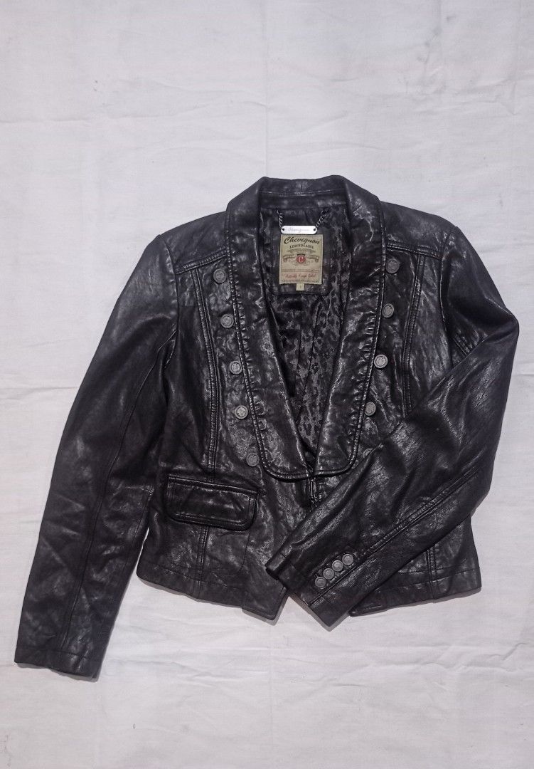 Chevignon Legend Label Black Leather Jacket (Category: Coats, Jackets and Outerwear) located in Manila. Submitted by mbk.thrift (Listing ID 1450132844, Image 1). Description: - Brand: Chevignon - Series: Legend Label - Style: Double-breasted leather jacket - Details: Button accents - Interior: Leopard print lining - Size: L - Look: Stylish.