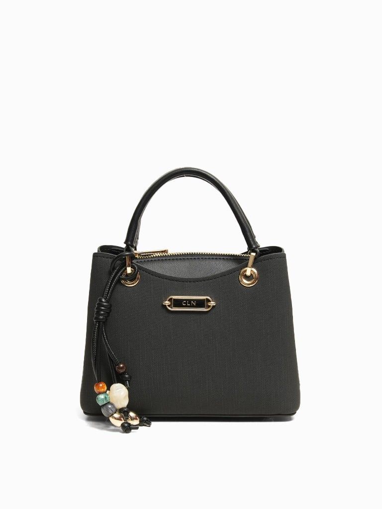 CLN Black Keira handbag (Category: Luxury Bags & Wallets) located in Manila. Submitted by shoes.moe (Listing ID 1450036804, Image 1). Description: - Brand: CLN - Color: Black - Material: Textured - Handle: Top handle - Hardware: Gold - Closure: Zipper - Features: Detachable charm with beads, patterned interior lining, spacious main compartment - Style: Great for everyday use - SRP 2499 PHP.