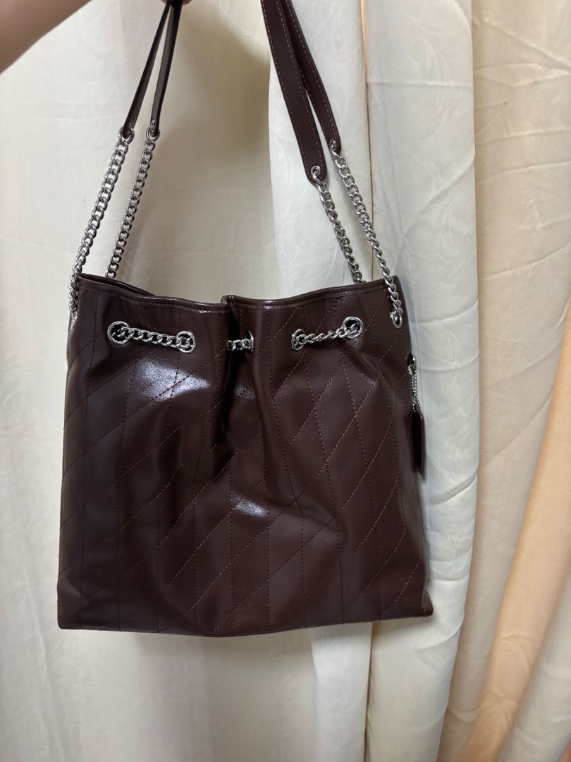 Coach Evelyn Chain shoulder bag (Category: Luxury Bags & Wallets) located in Caloocan City. Submitted by rhaenys123456_eagle (Listing ID 1450050120, Image 3). Description: No flaws. Ukaysource. Sophisticated Choco brown color. All hardwares have coach engrave Silver hardwares. Coded and with Brand creed. Made in vietnam Last price pls. No haggling Shipping nationwide + Sf .