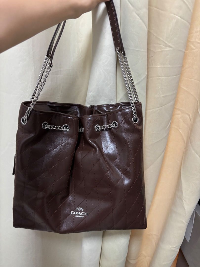 Coach Evelyn Chain shoulder bag (Category: Luxury Bags & Wallets) located in Caloocan City. Submitted by rhaenys123456_eagle (Listing ID 1450050120, Image 1). Description: No flaws. Ukaysource. Sophisticated Choco brown color. All hardwares have coach engrave Silver hardwares. Coded and with Brand creed. Made in vietnam Last price pls. No haggling Shipping nationwide + Sf .