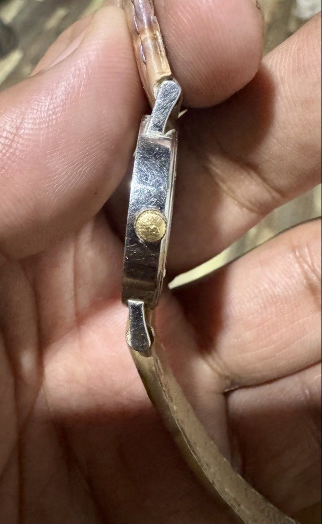 Corum Romvlvs Watch (Category: Women's Watches) located in Quezon City. Submitted by angace13 (Listing ID 1449995270, Image 3). Description: - Corum Romvlvs watch - Features Roman numerals - Gold-tone accents on a silver-tone case - Light beige leather strap - Water resistant - Shows some signs of wear on strap and case - A classic and timeless timepiece.