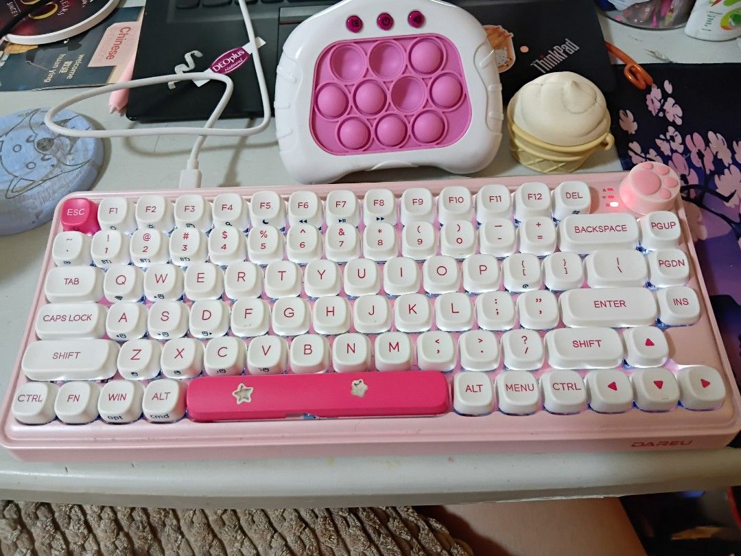DAREU A82/Z82 Tri-Mode Backlit Mechanical Keyboard (Category: Computer Keyboard) located in Pasay City. Submitted by pristinepages (Listing ID 1450050609, Image 3). Description: [SECOND HAND] DAREU A82/Z82 Cube Sugar Series: Your Purrfect Typing Companion ORIGINAL BRAND NEW PRICE: P4,100 SELLING PRICE: P3,000 RFS: Decluttering (and would like to buy a smaller keyboard) Includes, Type-C to USB charger cable, Keyboard Box, and complete accessories 