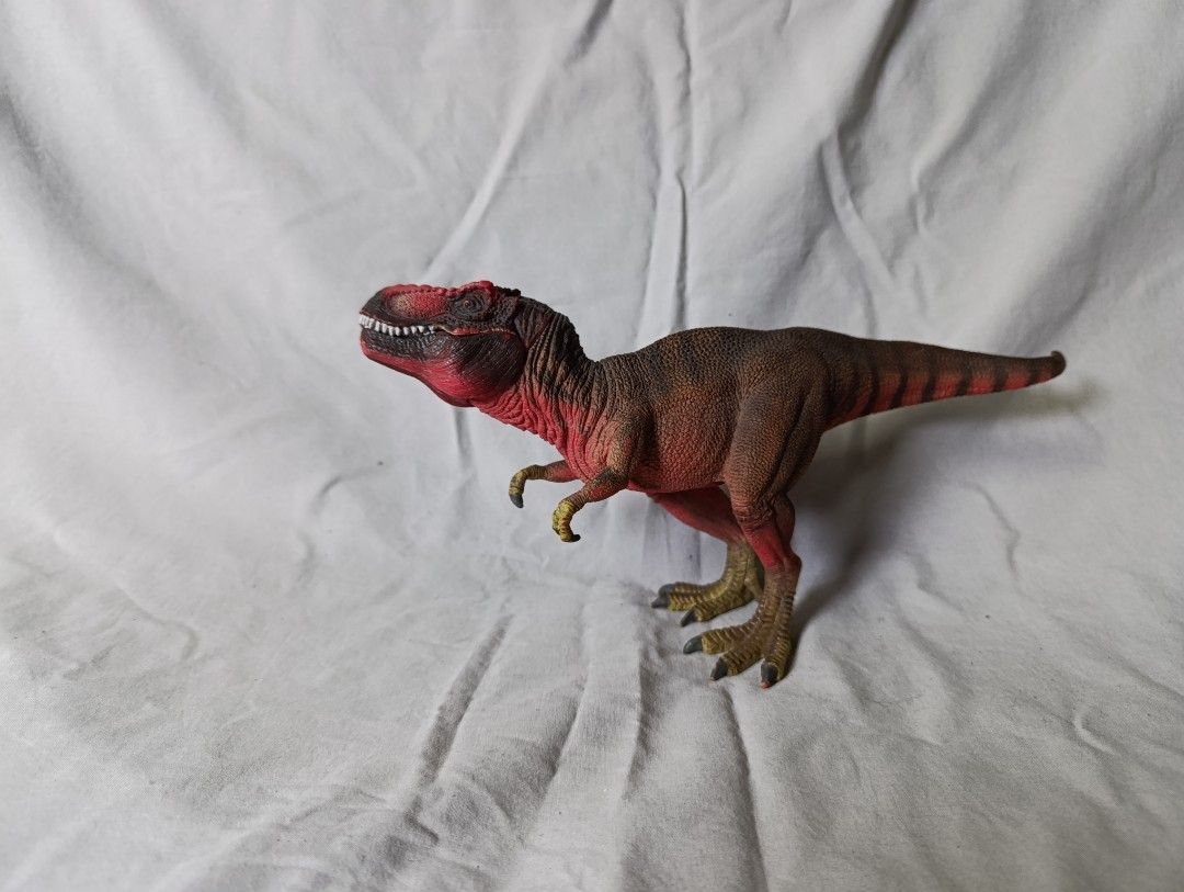 Dinosaur Toy Figure - Realistic T-Rex (Category: Figurines & Statues) located in Marikina City. Submitted by beeeekenneth (Listing ID 1449955225, Image 2). Description: -Schleich T-Rex '11 toy - Detailed sculpting and coloring - Mouth opens and closes - Made of durable material - Perfect for imaginative play or display - Ideal for collectors and dinosaur-loving kids Location: Marikina + we can do Lalamove for shipment and Gcash for payment pm for