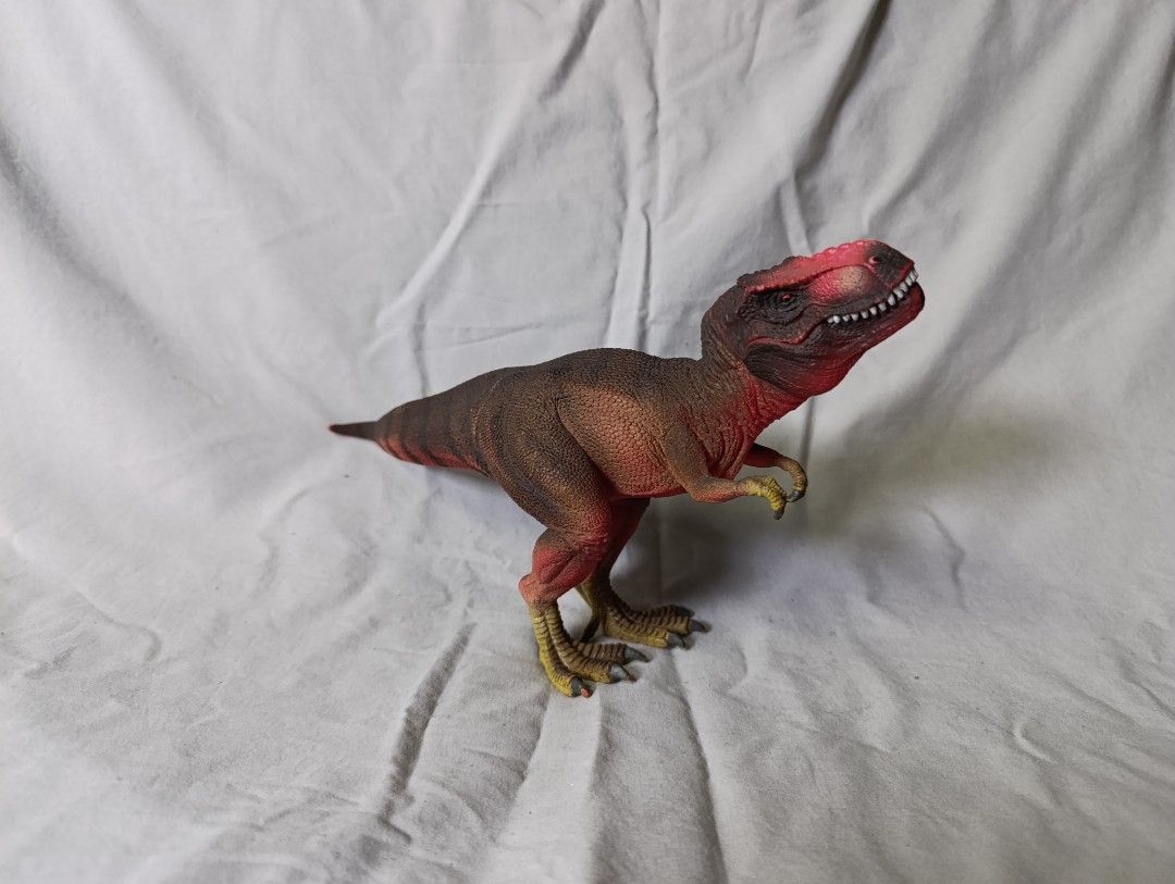 Dinosaur Toy Figure - Realistic T-Rex (Category: Figurines & Statues) located in Marikina City. Submitted by beeeekenneth (Listing ID 1449955225, Image 3). Description: -Schleich T-Rex '11 toy - Detailed sculpting and coloring - Mouth opens and closes - Made of durable material - Perfect for imaginative play or display - Ideal for collectors and dinosaur-loving kids Location: Marikina + we can do Lalamove for shipment and Gcash for payment pm for