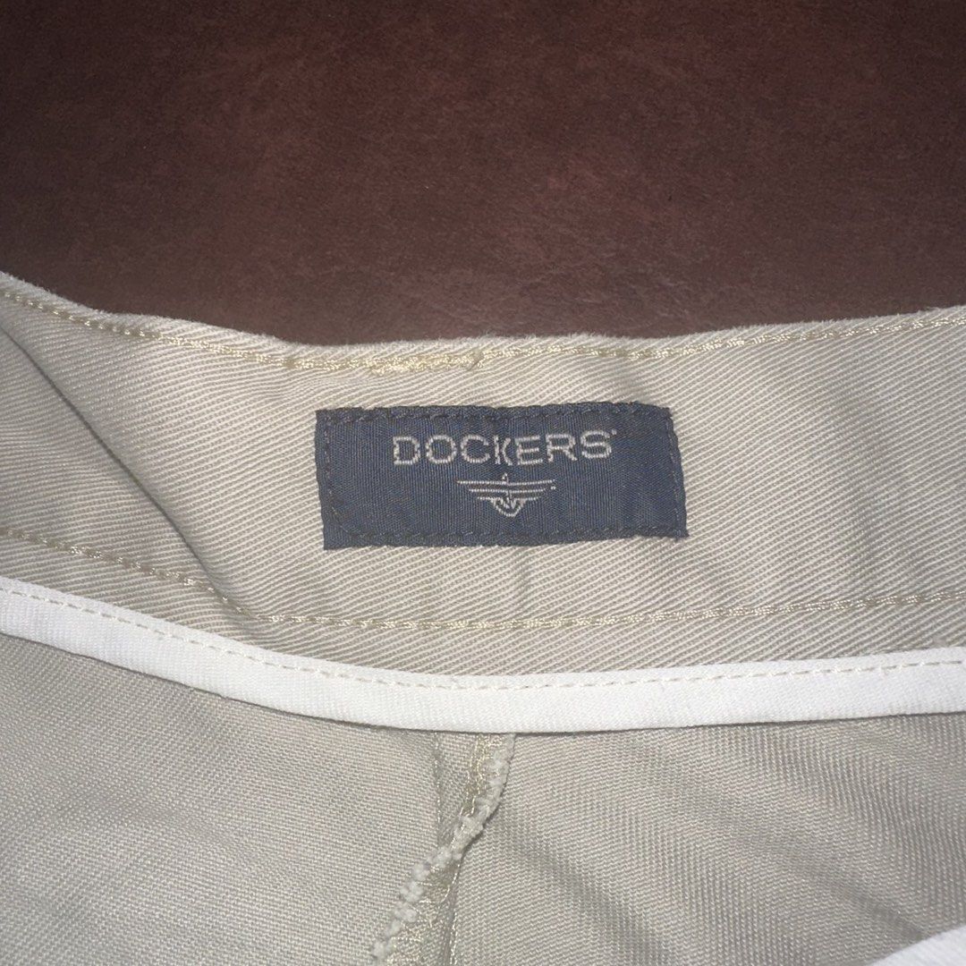 Dockers Khaki Pleated Shorts (Category: Shorts) located in Manila. Submitted by dadry (Listing ID 1449991911, Image 2). Description: - Classic khaki shorts by Dockers - Size: 38 - Length: 19.5 in - Features a pleated front - Secure button and zip closure - Two front pockets and two back pockets - Versatile for casual or smart-casual outfits.