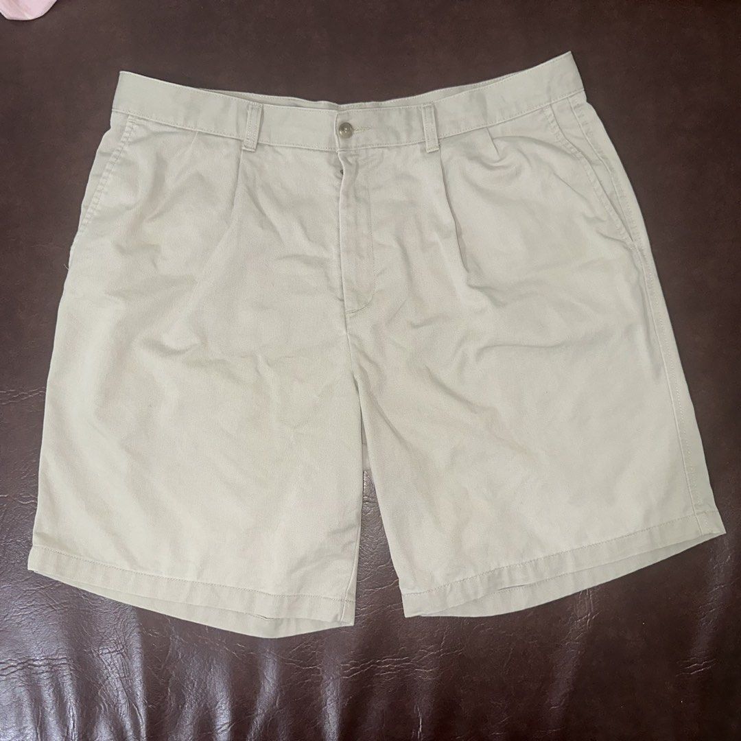 Dockers Khaki Pleated Shorts (Category: Shorts) located in Manila. Submitted by dadry (Listing ID 1449991911, Image 1). Description: - Classic khaki shorts by Dockers - Size: 38 - Length: 19.5 in - Features a pleated front - Secure button and zip closure - Two front pockets and two back pockets - Versatile for casual or smart-casual outfits.