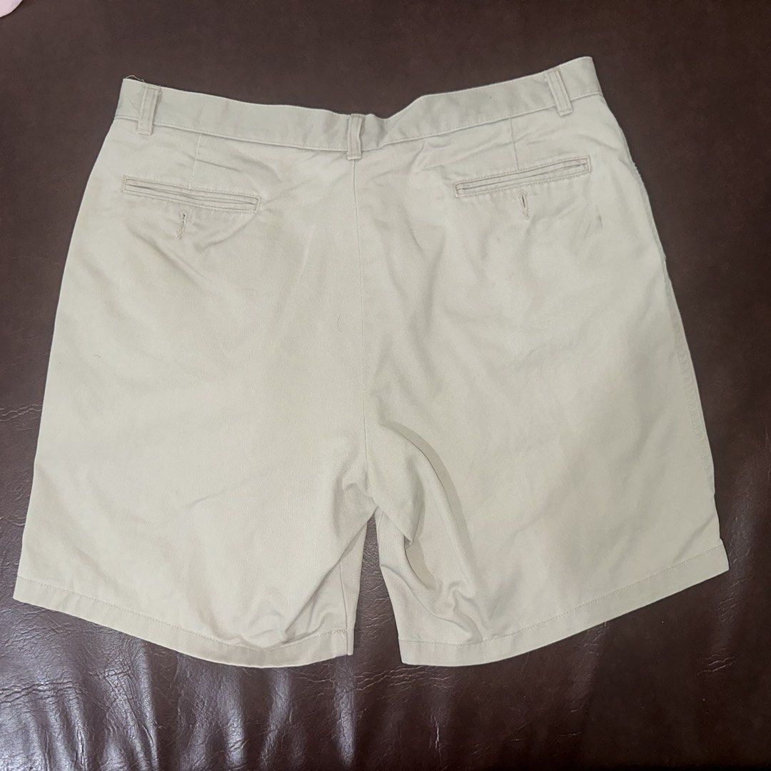 Dockers Khaki Pleated Shorts (Category: Shorts) located in Manila. Submitted by dadry (Listing ID 1449991911, Image 3). Description: - Classic khaki shorts by Dockers - Size: 38 - Length: 19.5 in - Features a pleated front - Secure button and zip closure - Two front pockets and two back pockets - Versatile for casual or smart-casual outfits.