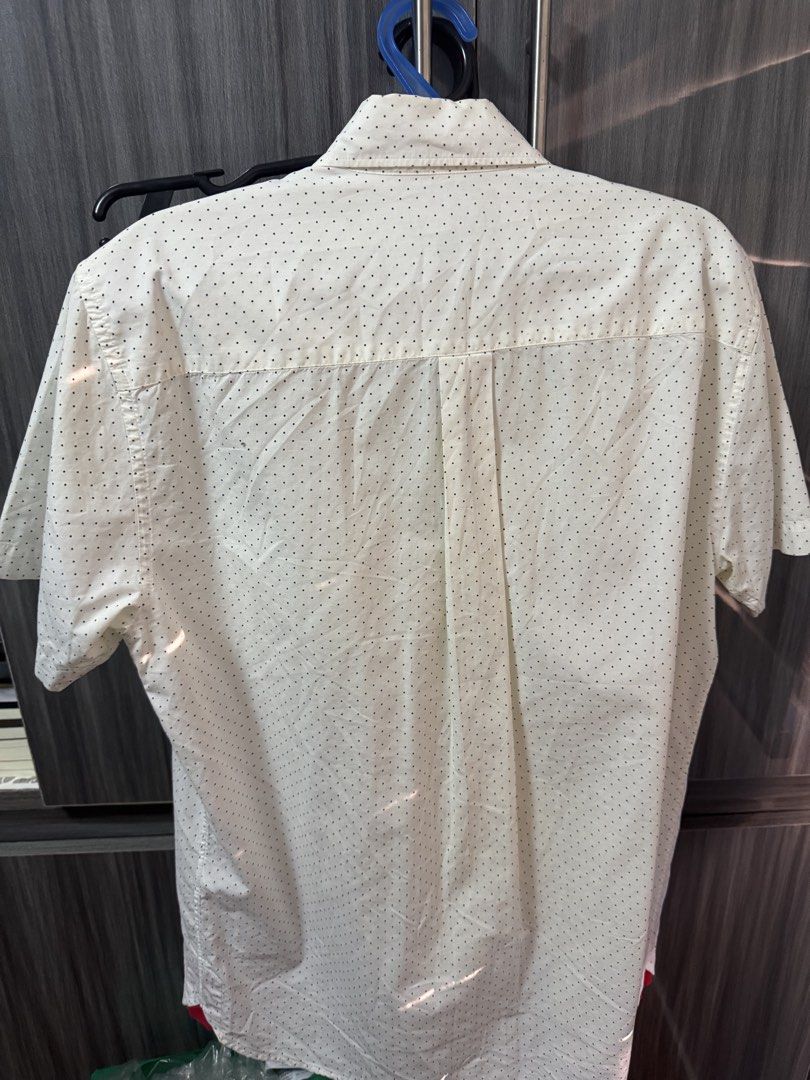 Fred Perry Short Sleeve Polka Dot Shirt JP S (Category: Tshirts & Polo Shirts ) located in Quezon City. Submitted by furious0128 (Listing ID 1450036421, Image 3). Description: - White short sleeve shirt from Fred Perry - Subtle black polka dot pattern all over - Navy and red stripe detail down the front placket - Small embroidered laurel wreath logo on the chest pocket - Button-down collar - Size JP S.