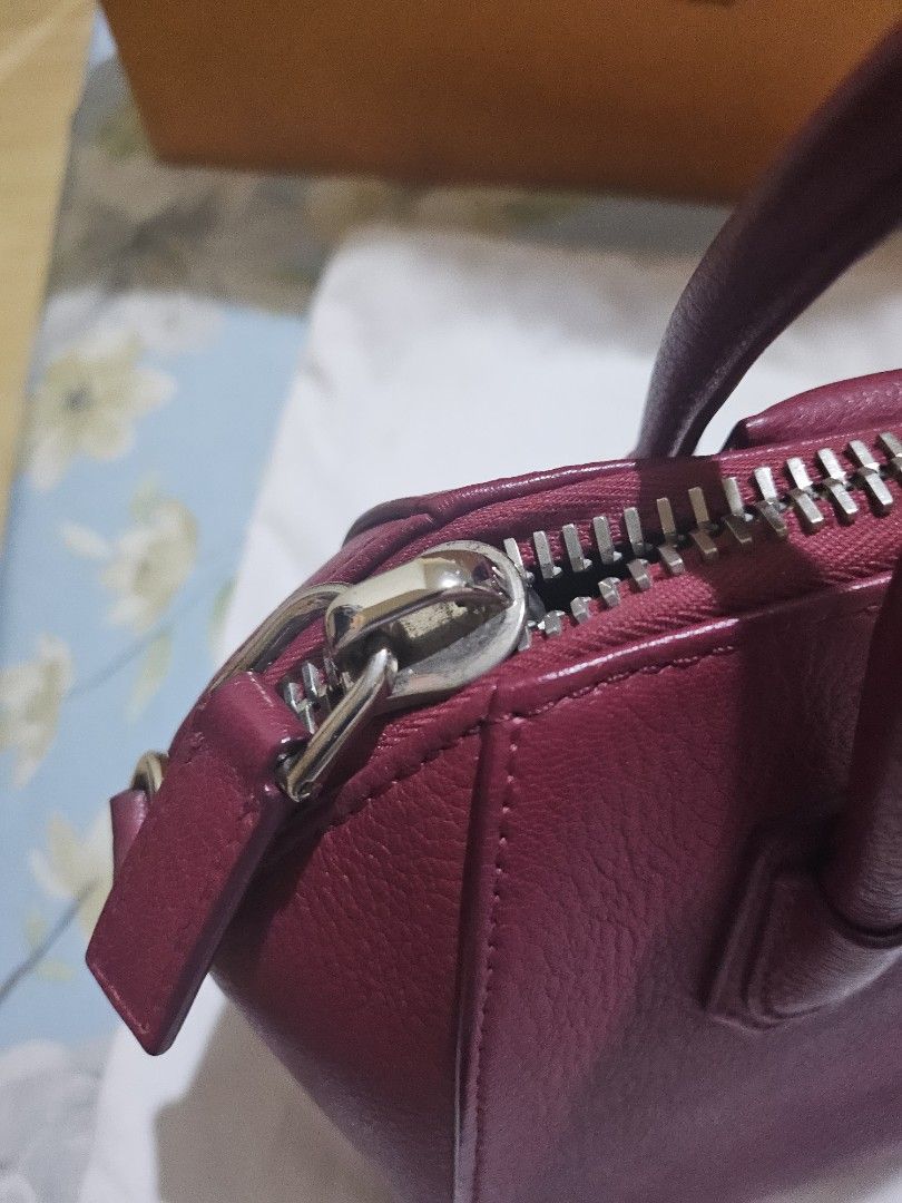 Givenchy Pink Leather Mini Bag (Category: Luxury Bags & Wallets) located in Las Pinas. Submitted by swiftdragon_0c099a (Listing ID 1450048055, Image 3). Description: - Genuine pink leather mini bag by Givenchy - Versatile with top handles and a detachable shoulder strap - Secure zipper closure - Comes with original dust bag and tag - Ideal size for carrying daily essentials.