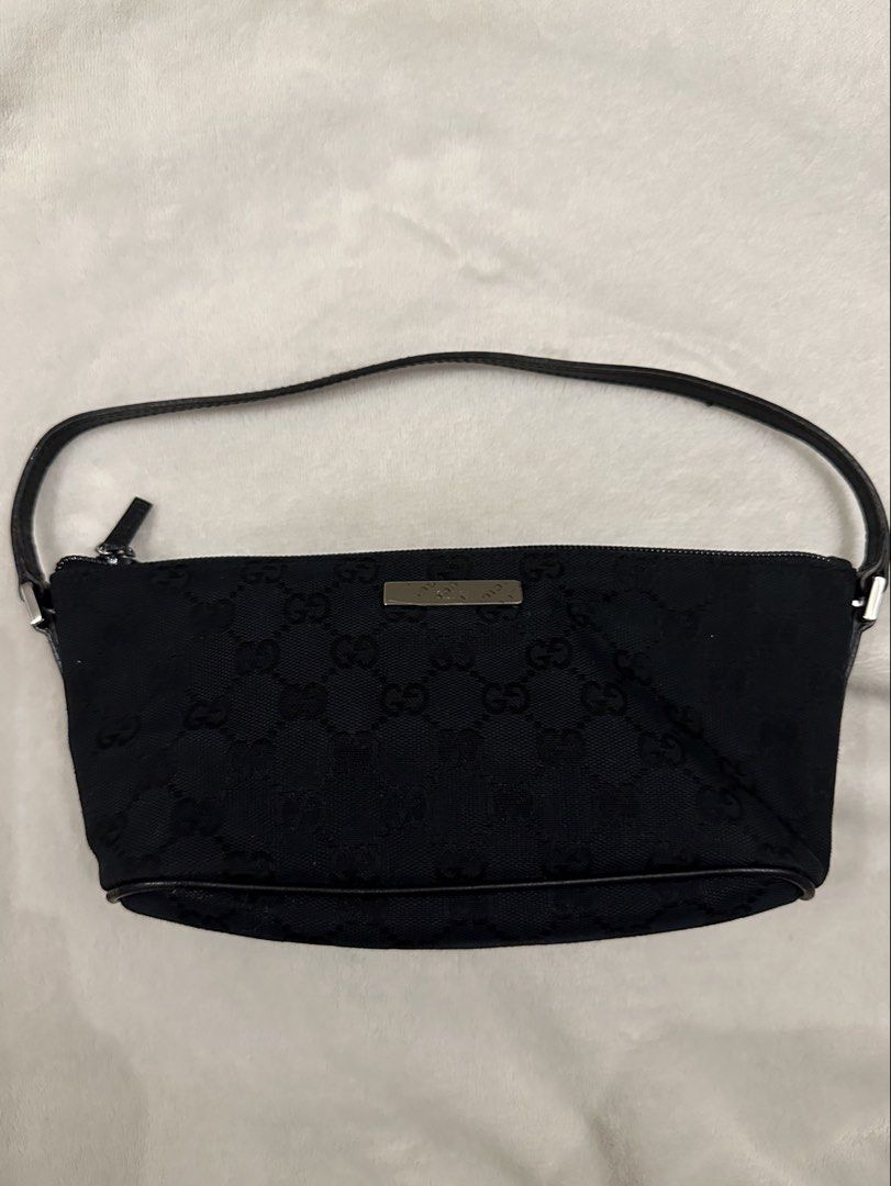 Gucci Pochette (Category: Luxury Bags & Wallets) located in Paranaque City. Submitted by missmargerrieal (Listing ID 1445136879, Image 2). Description: Original & Authentic Gucci Pochette💯 Like new, the gucci metal still have plastic, di ko po tinatanggal para di mgasgasan Bought in Off House Japan. Money Back Guaranteed Authentic Vintage Gucci.👌 Handle Leather still intact no flaws. Flaws, on the edge super minimal and not visible.. U can requ