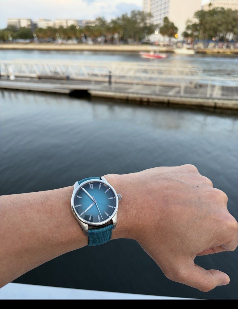 H. Moser & Cie Watch with Box and Papers (Category: Luxury Watches) located in Manila. Submitted by koji18 (Listing ID 1450124728, Image 2). Description: - Brand: H. Moser & Cie Pioneer Mega Cool - Dial Color: Teal - Strap Color: Teal - Condition: Very Rare Piece - Includes: Original Box, Guarantee, Certificate of Origin 2 extra OEM Straps 17k each - Origin: Made in Switzerland Open to trade with Rolex Submariner or batman ( willing to add cash )