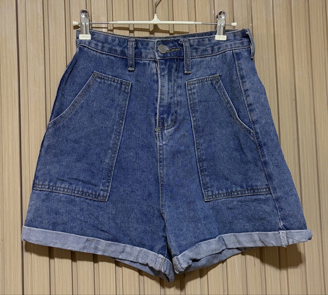 High Waisted Denim Shorts with Cargo Pockets (Category: Shorts) located in Santa Cruz. Submitted by callilithings (Listing ID 1450072335, Image 1). Description: - High-waisted denim shorts - Features large front cargo pockets - Cuffed hem detail - Classic blue denim wash - Perfect for casual wear - Easy to pair with any top.