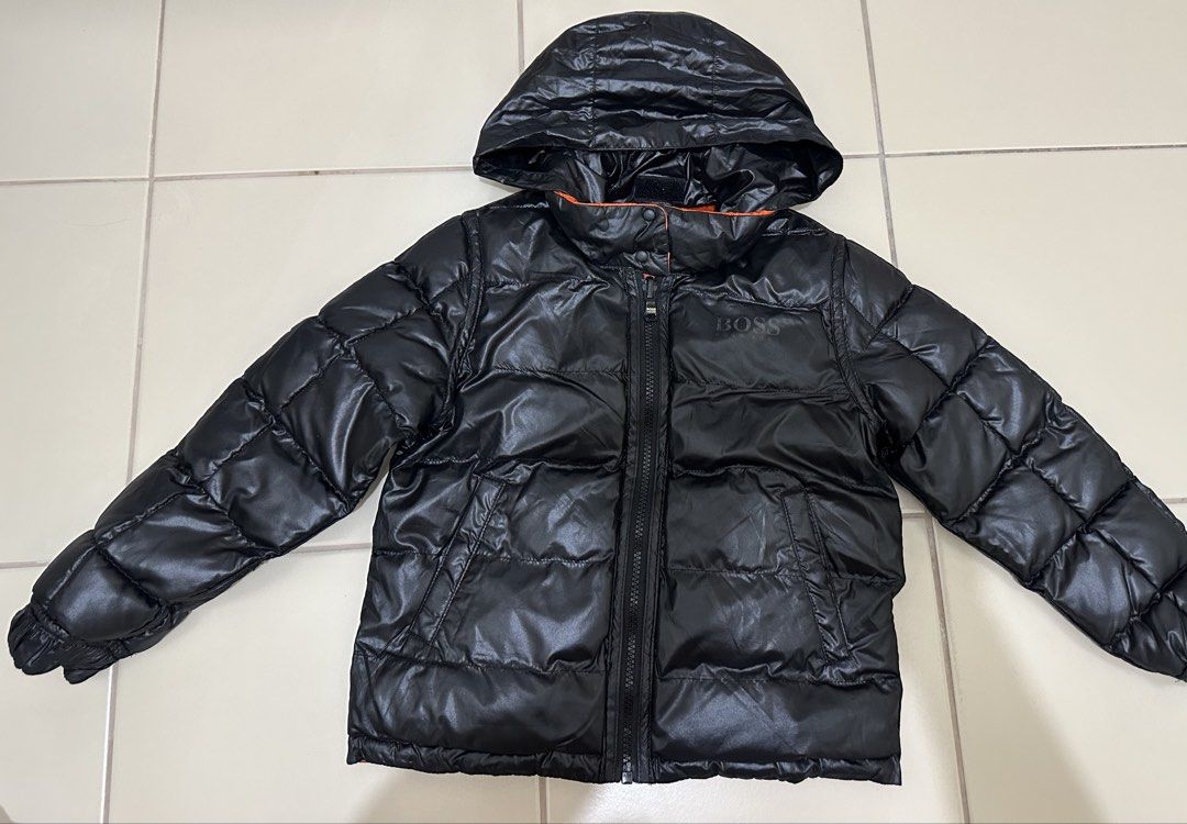 HUGO BOSS reversible puffer black orange packable hood (Category: Babies & Kids Fashion) located in Cavite. Submitted by jdfselectify (Listing ID 1450070982, Image 2). Description: Very good condition 6 on tag can fit 5-8yo Unisex Reversible Packable hood.
