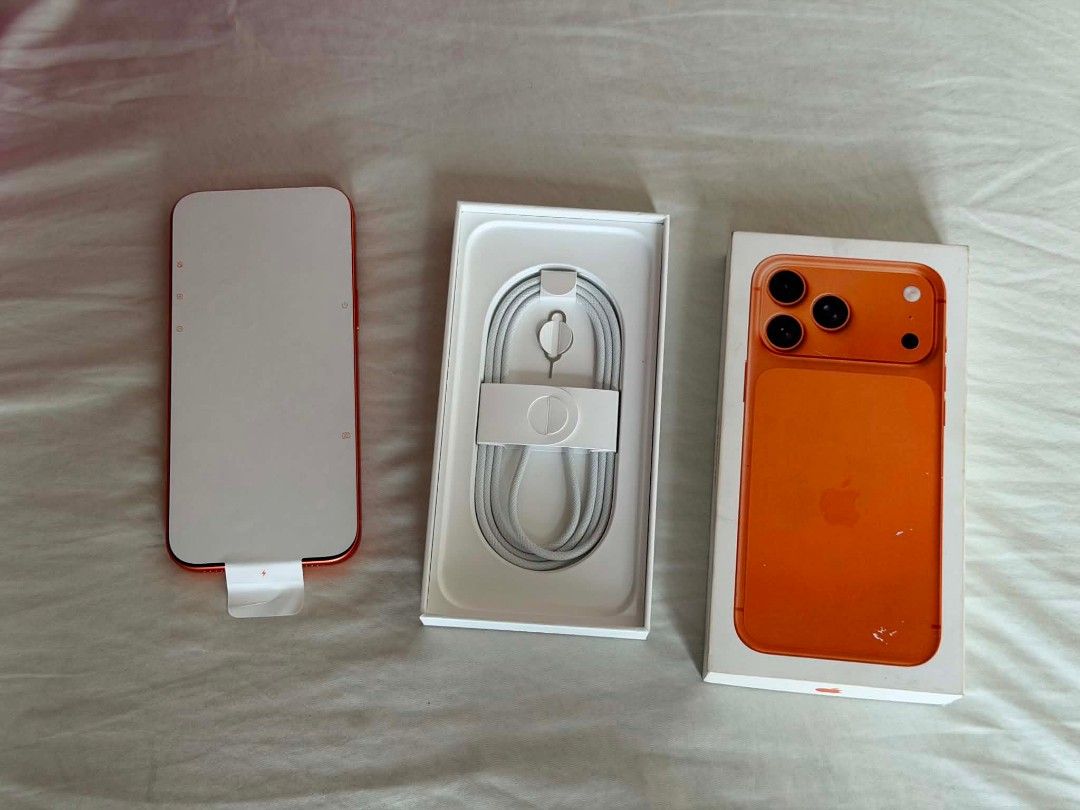 iPhone 17 Pro Max 512GB Cosmic Orange (Category: iPhone 17 Series) located in Manila. Submitted by warmfox_673e9c (Listing ID 1450131962, Image 2). Description: iPhone 17 Pro Max 512GB Orange 100% Battery health 133 cycle count Local NTC Variant No sim restrictions Factory unlocked Complete Package Unused Cable Apple Warranty: March 22, 2027 Honest issue: Paint chip Check last photos for reference Sale 78,990 only or swap to lower unit plus cash 