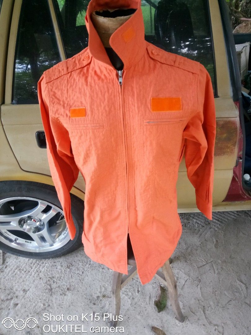 Japanese Teisen rescue jacket (Category: Toys & Games) located in Taiping. Submitted by peijai_z (Listing ID 1450001057, Image 1). Description: Japanese Teisen rescue jacket in bright orange. saizL pit 21 L30.