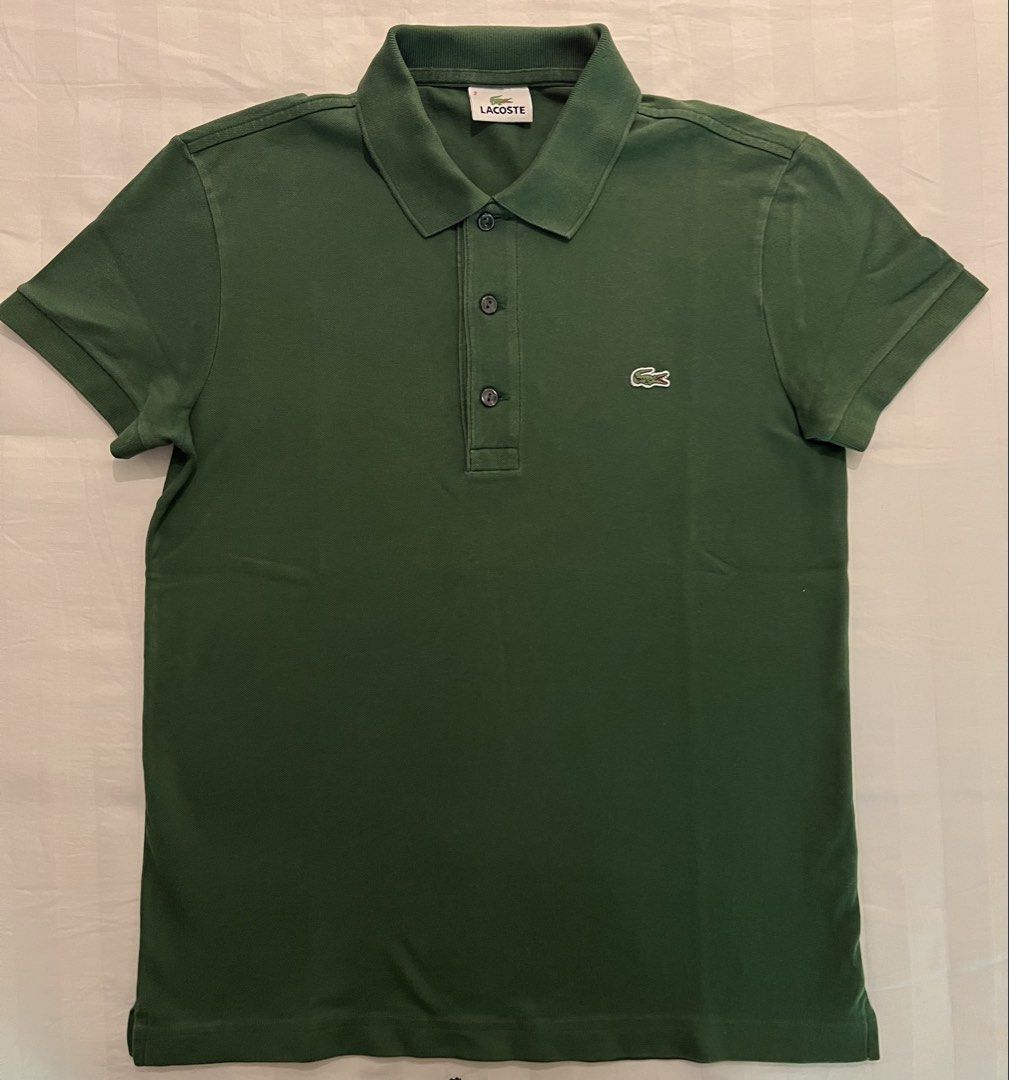 Lacoste Shirt (Category: Shirts) located in Quezon City. Submitted by inthefrow (Listing ID 1450035745, Image 1). Description: - Preloved - In a hunter green color - Chest measures 18” • Best price already .