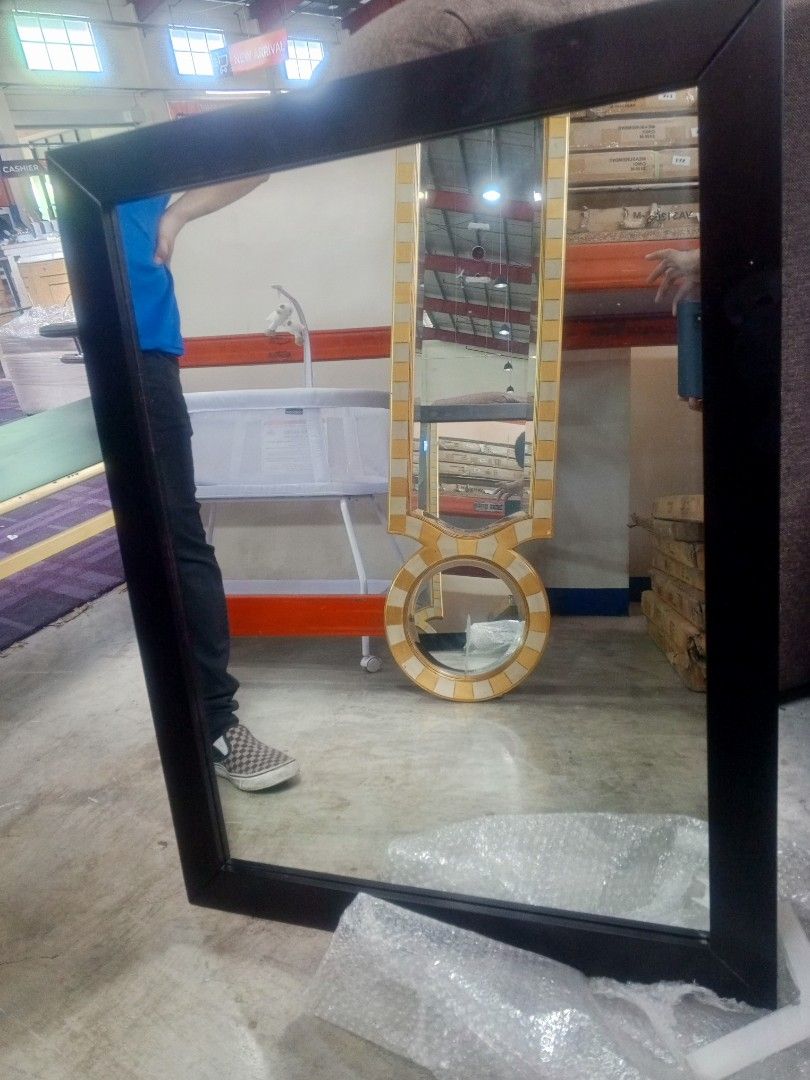 Large Black Framed Mirror with Decorative Accent Mirror (Category: Mirrors) located in Caloocan City. Submitted by hmr.gomez (Listing ID 1450004765, Image 1). Description: - Large black framed mirror, perfect for hallways or bedrooms. - Smaller decorative mirror with a yellow and white mosaic pattern included. - Both items are ready for a new home. - Feel free to ask any questions!.