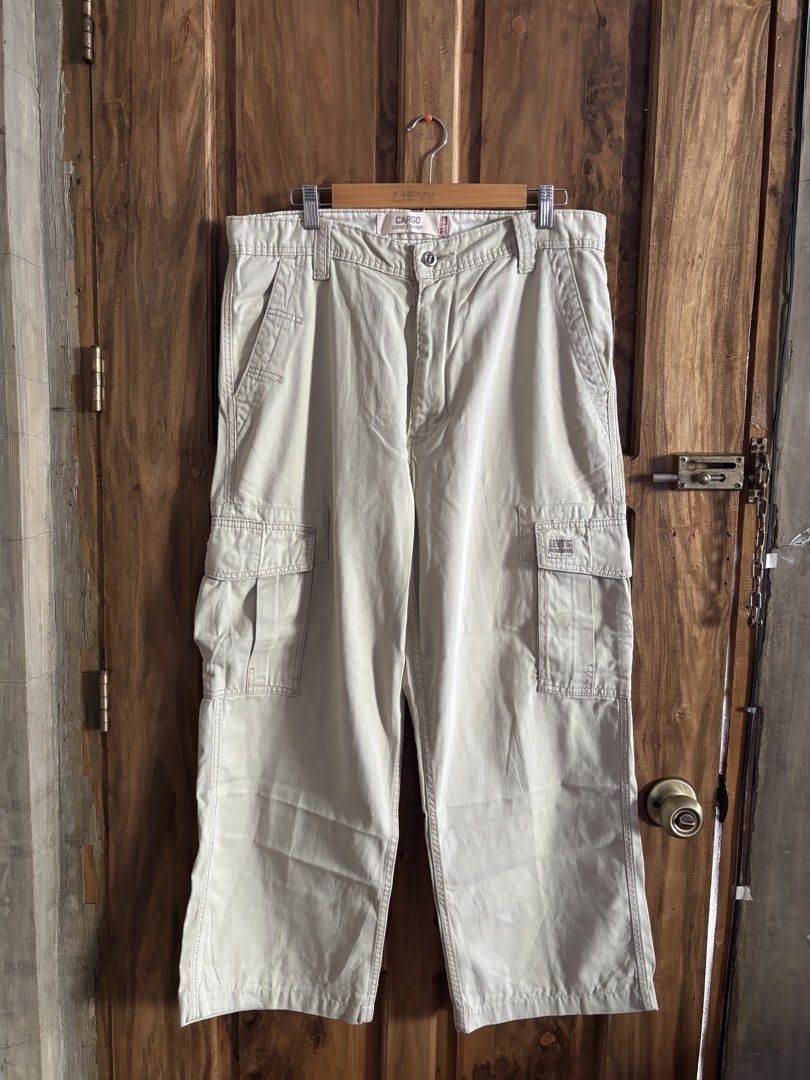 Levi's Workwear Cargo Loose Straight Pants (Category: Jeans) located in Maasin. Submitted by chevyferna66833 (Listing ID 1449976250, Image 1). Description: Vintage Levi’s Cargo Loose Straight Pants🤎 (Beige) Waistline 34-35 Length 39 Leg opening 14 Hem 10 Good condition need wash Mine 999.