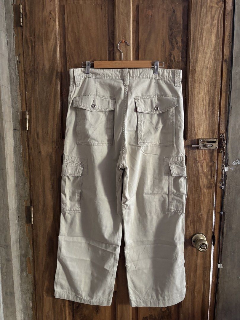 Levi's Workwear Cargo Loose Straight Pants (Category: Jeans) located in Maasin. Submitted by chevyferna66833 (Listing ID 1449976250, Image 2). Description: Vintage Levi’s Cargo Loose Straight Pants🤎 (Beige) Waistline 34-35 Length 39 Leg opening 14 Hem 10 Good condition need wash Mine 999.