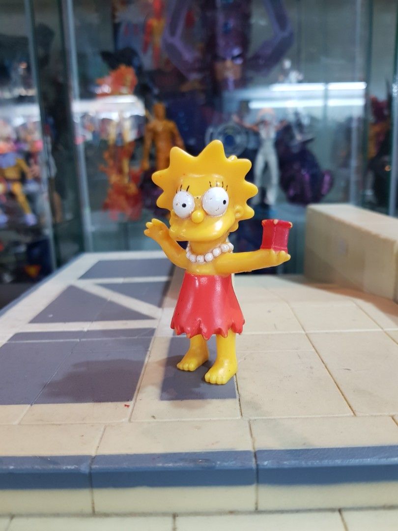 Lisa Simpson (Category: Toys & Games) located in Ipoh. Submitted by sarahdzul (Listing ID 1449977327, Image 1). Description: Original Matt Groening by Burger King Lisa from The Simpsons figure size around 3 inch Rm 25 Cod Ipoh Postage +$.
