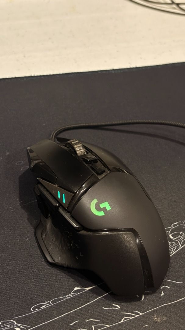 Logitech G502 HERO Wired Gaming Mouse (Category: Mouse & Mousepads) located in Makati City. Submitted by barfuncle (Listing ID 1450121551, Image 2). Description: - Logitech G502 HERO wired gaming mouse - Features RGB lighting - Programmable buttons for customization - Excellent performance for gaming - In perfect working condition - Selling because of a setup upgrade - Feel free to ask any questions!.