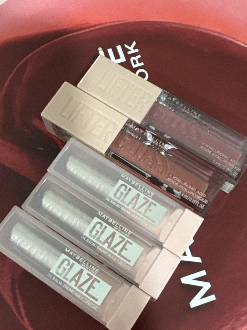 Maybelline Lifter Gloss & Glaze Lip Balm (Category: Makeup) located in Kuala Lumpur. Submitted by saveurdollar (Listing ID 1449993877, Image 2). Description: - Brand new & sealed Maybelline lip bundle - 2 Maybelline Lifter Glosses - 3 Maybelline Lifter Glaze Oil Balms - Shades included: 004 Cherry Swirl, 005 Peach Quench, 006 Caramel Glow - Two additional glosses also included - Achieve a hydrated, glossy finish RM20 each RM100 for ALL.