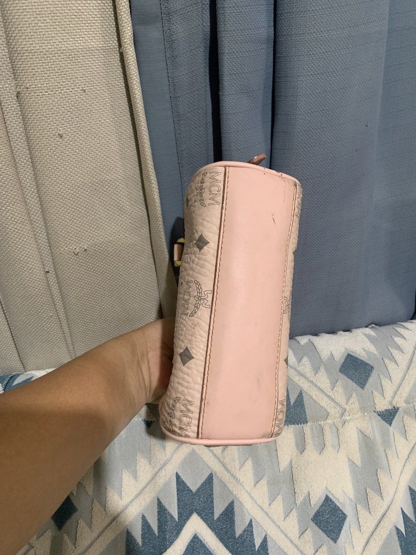 MCM Pink Monogram Mini Boston Bag (Category: Luxury Bags & Wallets) located in Liloan. Submitted by jinalyns (Listing ID 1450045255, Image 3). Description: - Cute pink MCM mini Boston bag - Classic monogram print - Gold hardware details - Zipper closure - Small handles - Interior card slot - Some signs of wear on exterior and handles - Great for carrying essentials.