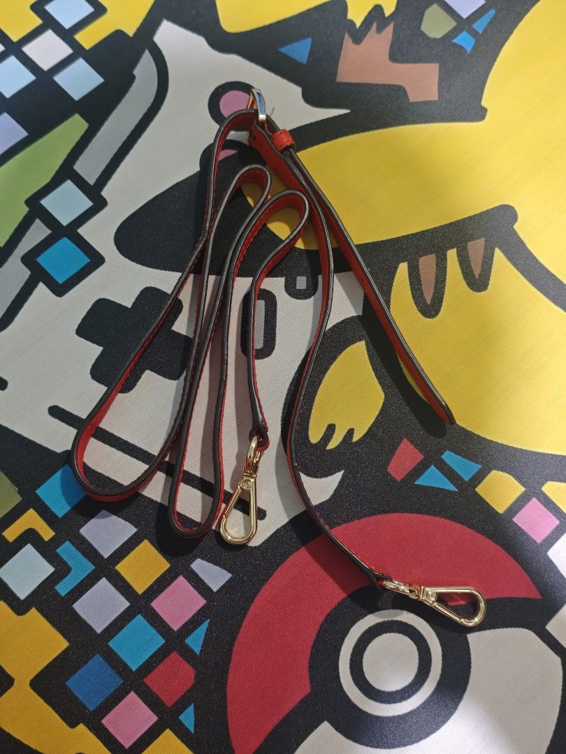 Michael Kors Red Leather Bag Strap with Gold Hardware (Category: Luxury Bags & Wallets) located in San Pedro. Submitted by streetthriftsph (Listing ID 1450104408, Image 2). Description: - Genuine red leather strap - Designed for Michael Kors bags - Elegant gold hardware details - Adjustable length with buckle closure - Easily detachable with clips - Ideal for replacing a worn strap or personalizing your bag.