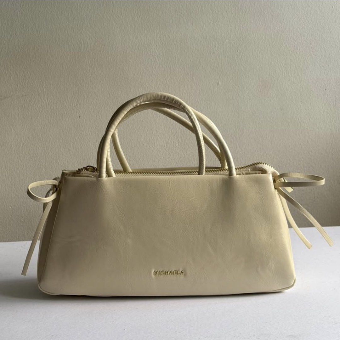 MICHAELA Classy Elongated Underarm Bag with Bows (Category: Shoulder Bags) located in Manila. Submitted by mimitchii (Listing ID 1450058912, Image 1). Description: - Used once - Original Price: 1,299.