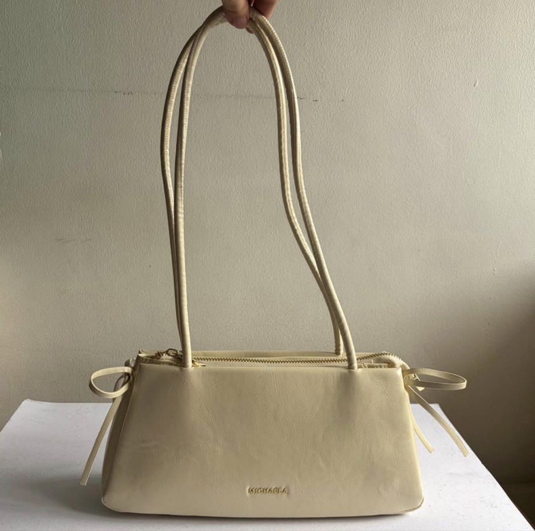 MICHAELA Classy Elongated Underarm Bag with Bows (Category: Shoulder Bags) located in Manila. Submitted by mimitchii (Listing ID 1450058912, Image 3). Description: - Used once - Original Price: 1,299.
