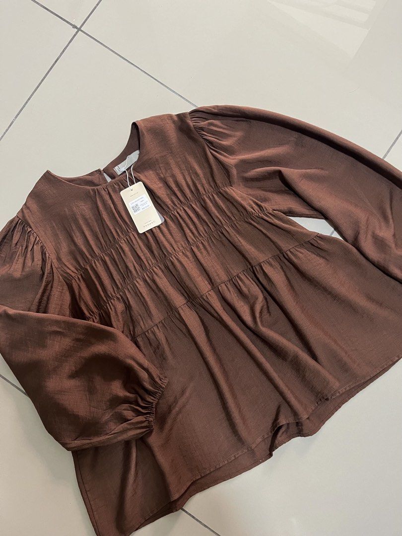 MnB linen blouse (Category: Blouses) located in Johor Bahru. Submitted by smallspace.co (Listing ID 1450056194, Image 3). Description: Rich brown with tag (sold at store) Pit until 22 inch Length 25 inch Beli dua helai utk adik tp tk muat.