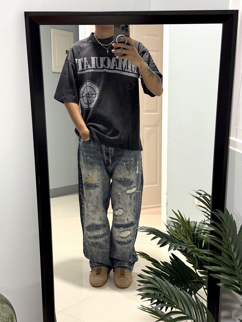 MNML Ultra Baggy Distressed Jeans (Category: Jeans) located in San Juan, La Union. Submitted by bornunderground.ph (Listing ID 1450091985, Image 1). Description: MNML Ultra Baggy Distressed Jeans Authentic/ Like New Sale @ ₱2,495 Plus Shipping - It delivers a heavily customized, vintage streetwear aesthetic. Size: 30 (Model Height 5”7) Silhouette: Cut in an ultra-baggy, wide-leg straight fit that pools casually over sneakers. Heavy Destruction: F