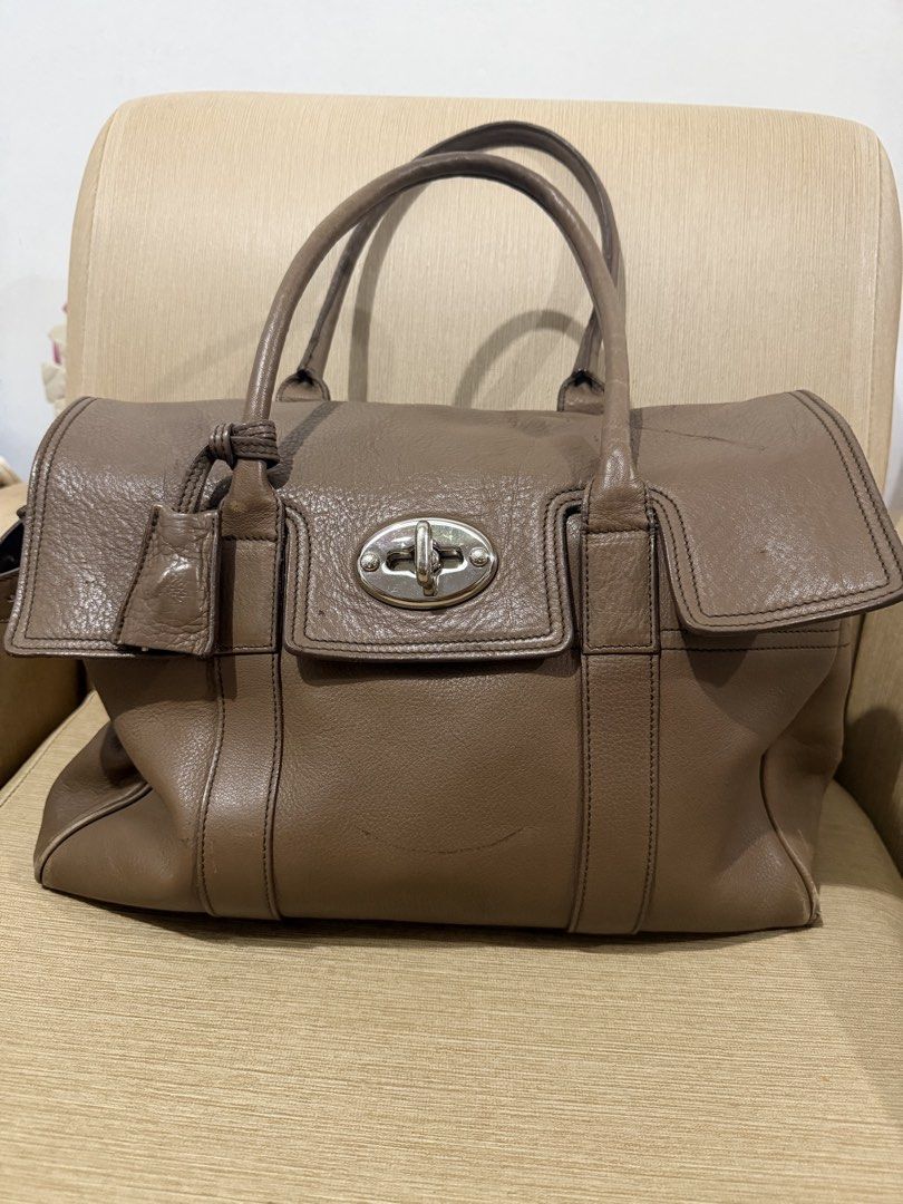 Mulberry bayswater medium leather bag (Category: Tote Bags) located in Cabuyao City. Submitted by mhikethrifters (Listing ID 1449975578, Image 2). Description: Mulberry bayswater taupe leather bag Made in turkey Medium size Silver accessories Authentic / original Verygood condition With minimal issue(see last pics) Need restoration Orininal price is around 70k-80k Mine is only 5999 pesos only Nego sa sure buyer Add shipping fee via j&t Or lalamov