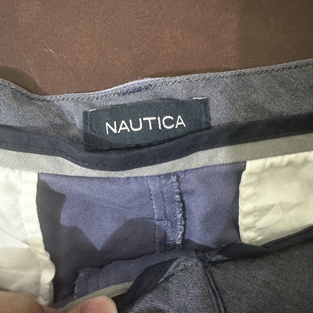 Nautica Men's Shorts (Category: Shorts) located in Manila. Submitted by dadry (Listing ID 1449991895, Image 2). Description: - Nautica shorts in a nice blue color. - Size: 36 - Length: 19 - Classic fit, ideal for casual wear. - Convenient front and back pockets. - Secure button and zip closure. - Great for warmer weather..