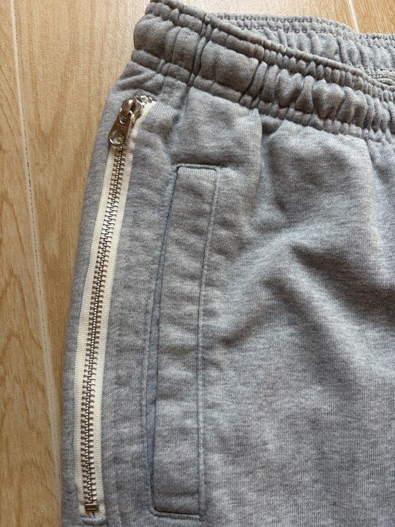 Nike Dri-Fit Standard Issue Grey Sweatpants Size M (Category: Joggers) located in San Fernando. Submitted by agapeeem69 (Listing ID 1450024522, Image 3). Description: - Grey Nike sweatpants - Dri-Fit material for comfort and performance - Standard Issue line, classic and timeless style - Features zippered side pockets for secure storage - Adjustable drawstring waist for a personalized fit - Elasticated cuffs for a snug feel - Made in China - Size