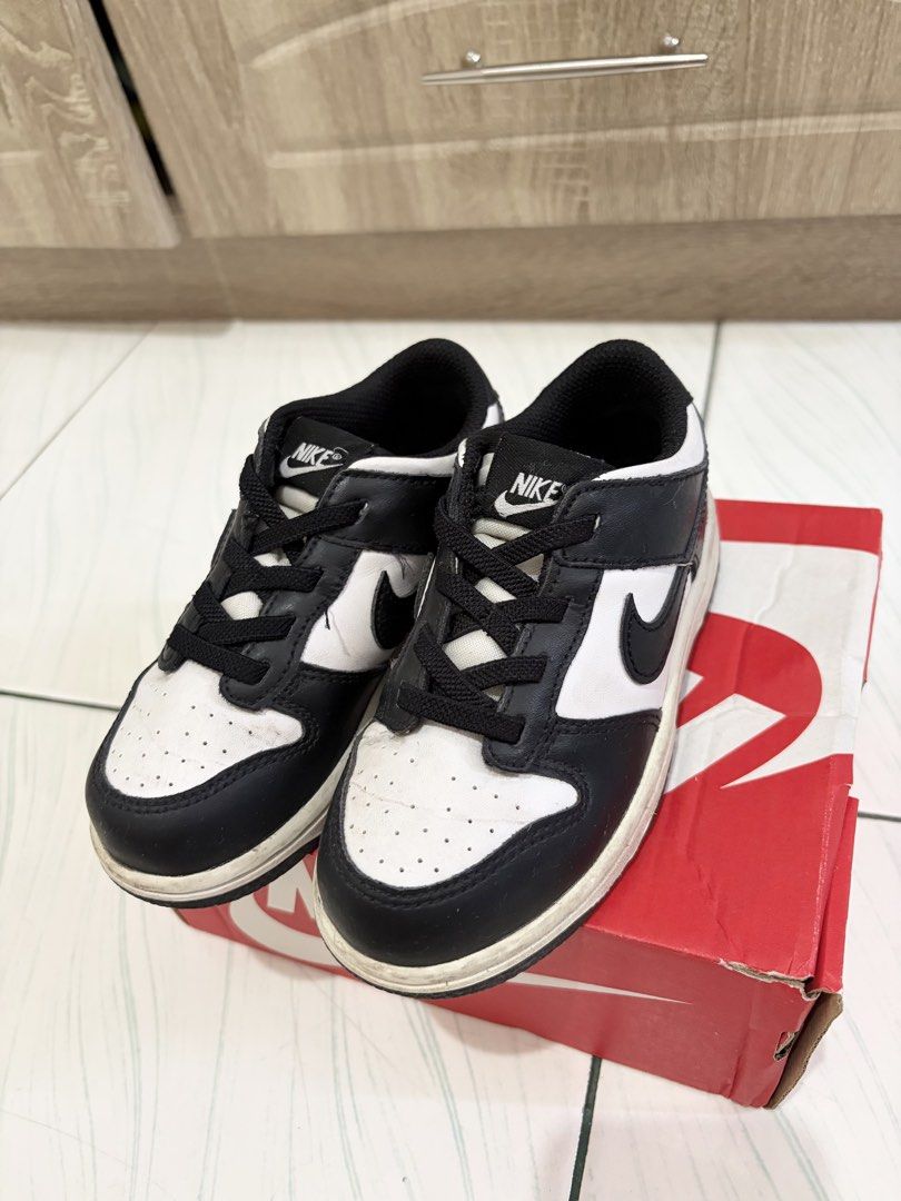 Nike Dunk Low Toddler Shoes Black White (Category: Babies & Kids Fashion) located in San Fernando. Submitted by superdealitems (Listing ID 1449994334, Image 2). Description: - Toddler Nike Dunk Lows -Big size for slim feet up to 17.5cm to 18cm kasya - Classic black and white colorway - Laces are intact - Soles show minor wear, good grip remaining - Includes original Nike box .