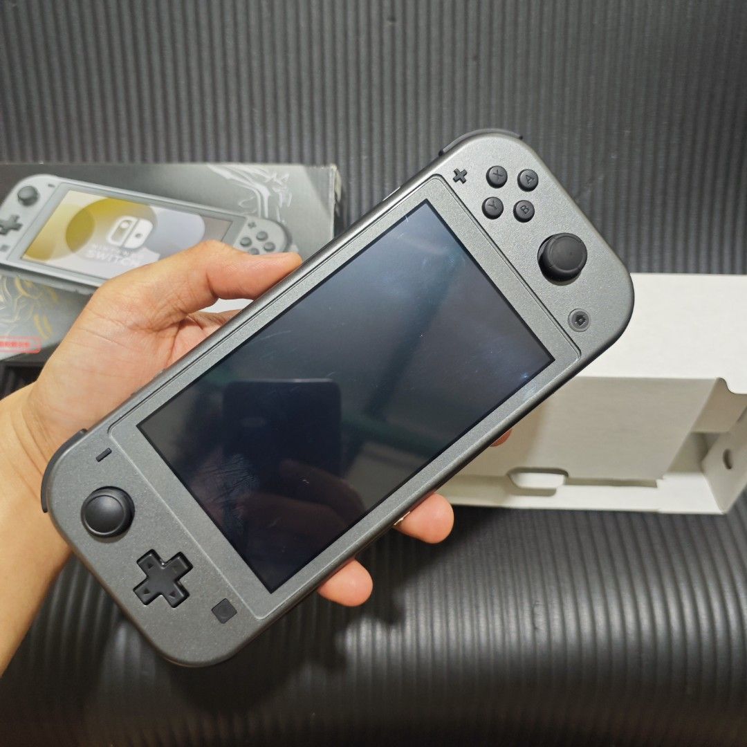 Nintendo Switch Lite Palkia Dialga Edition (Complete) (Category: Nintendo) located in Quezon City. Submitted by shopme_gadget30 (Listing ID 1450096478, Image 3). Description: kindly Read the details 8/10 Good Condition no issue in performance no drifting all buttons working with Minor Scratches at back cover with tempered glass since day 1 not yet jb or cfw No Games No sd card Bawal sa maxadong Maselan inclusion Box Console Original Charger freeb