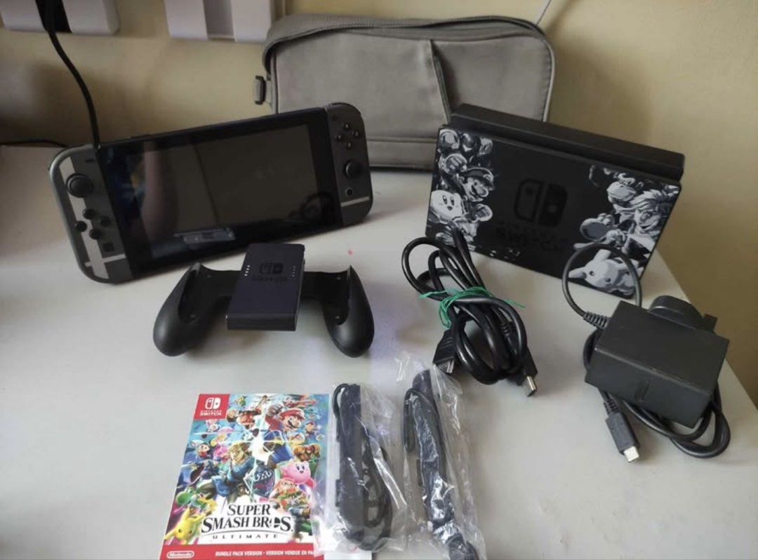 Nintendo Switch Super Smash Bros. Ultimate Edition Console Bundle (Category: Nintendo) located in Las Pinas. Submitted by tanmaine (Listing ID 1450061652, Image 1). Description: - Nintendo Switch Console - Super Smash Bros. Ultimate Edition - Includes Dock, Joy-Cons, Grip, AC Adapter, and HDMI Cable - Comes with Super Smash Bros. Ultimate Game - Everything you need to start playing right away - Perfect for both home and on-the-go gaming.