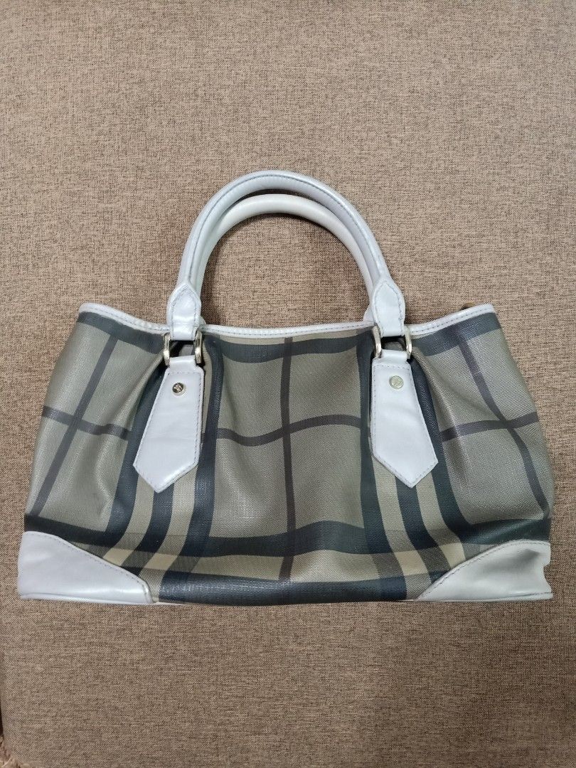 Original burberry leather tote bag (Category: Luxury Bags & Wallets) located in Binmaley. Submitted by fashionluxury058 (Listing ID 1449967686, Image 1). Description: original burberry leather tote bag in good condition size: medium genuine leather.