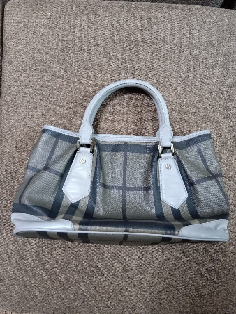 Original burberry leather tote bag (Category: Luxury Bags & Wallets) located in Binmaley. Submitted by fashionluxury058 (Listing ID 1449967686, Image 2). Description: original burberry leather tote bag in good condition size: medium genuine leather.