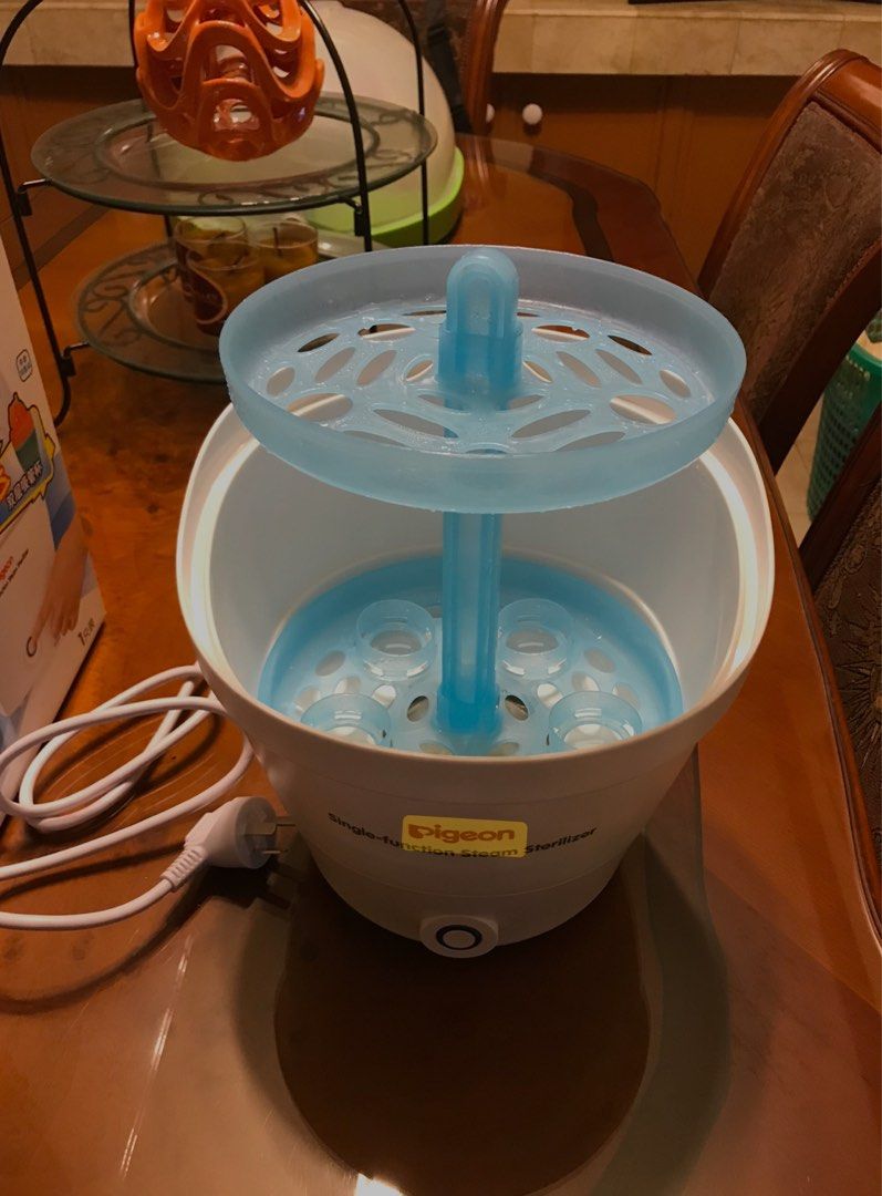 Pigeon Steamer (Preloved with freebies (Category: Breastfeeding & Bottle Feeding) located in Pasig City. Submitted by annefashionshoppe (Listing ID 1450073616, Image 2). Description: Pigeon Steamer (Preloved with freebies) With box Freebies (sippy cup & tongs ) Good condition (see attached photo and for sure buyer i can send video too) Rfs (hindi na ginagamit) First come first serve/to pay basis For pick up only or thru lalamove/grab rider.