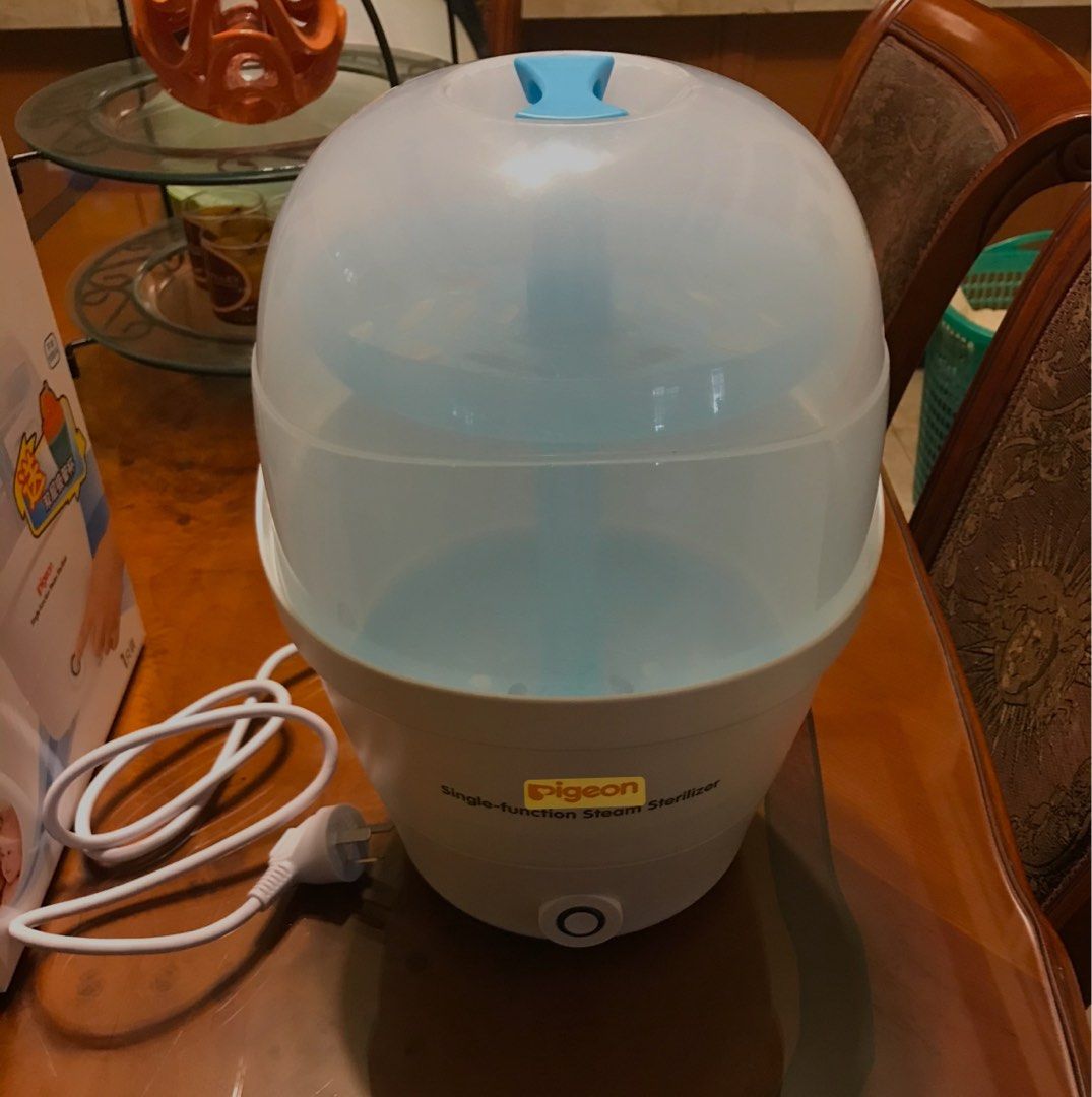Pigeon Steamer (Preloved with freebies (Category: Breastfeeding & Bottle Feeding) located in Pasig City. Submitted by annefashionshoppe (Listing ID 1450073616, Image 1). Description: Pigeon Steamer (Preloved with freebies) With box Freebies (sippy cup & tongs ) Good condition (see attached photo and for sure buyer i can send video too) Rfs (hindi na ginagamit) First come first serve/to pay basis For pick up only or thru lalamove/grab rider.