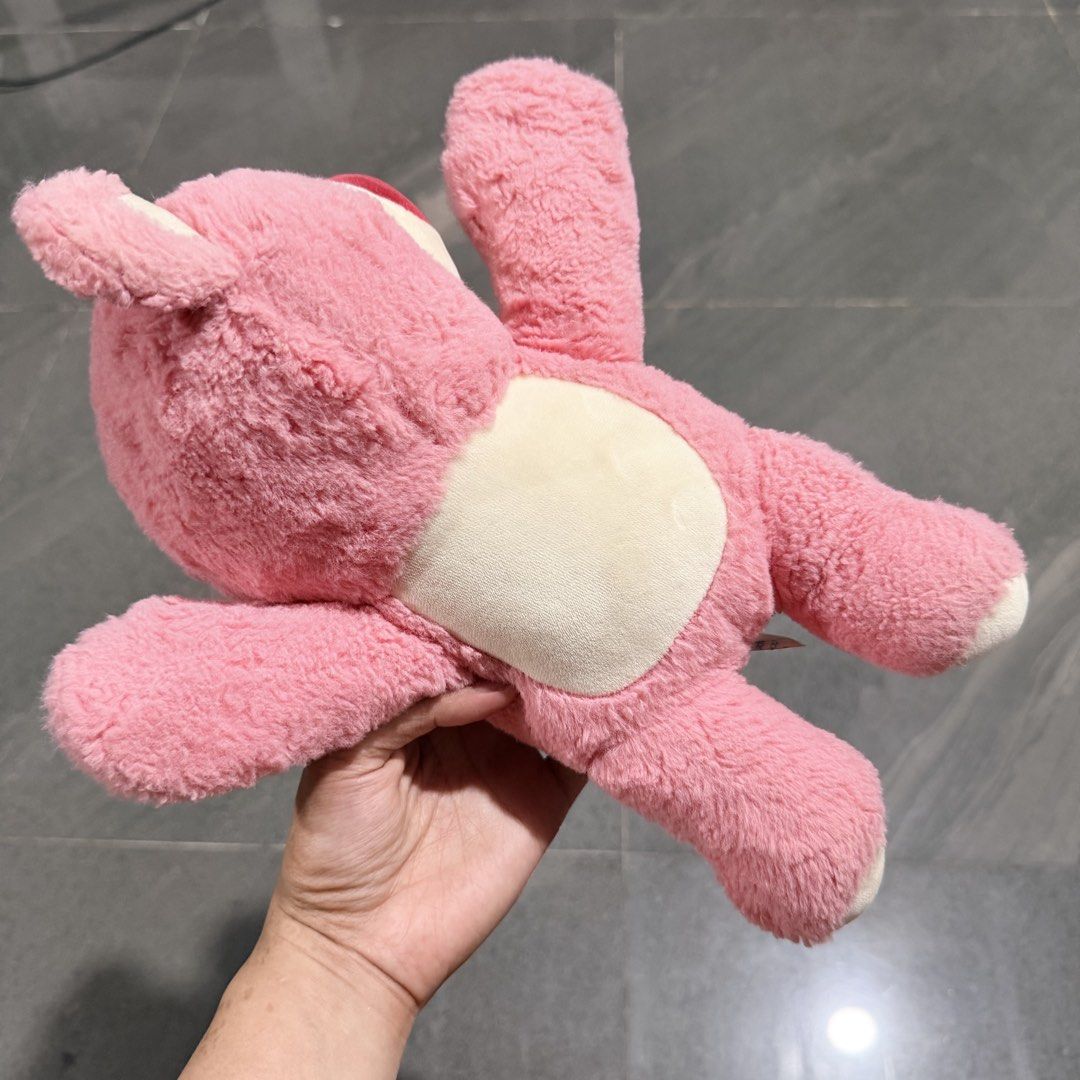 Pink Strawberry Bear Plush Toy (Category: Plushies & Soft Toys) located in Quezon City. Submitted by ThirftyClub (Listing ID 1449953468, Image 2). Description: - Adorable pink bear plushie - Features a cute strawberry on its head - Made with soft and cuddly material - Perfect for collectors or as a thoughtful gift.