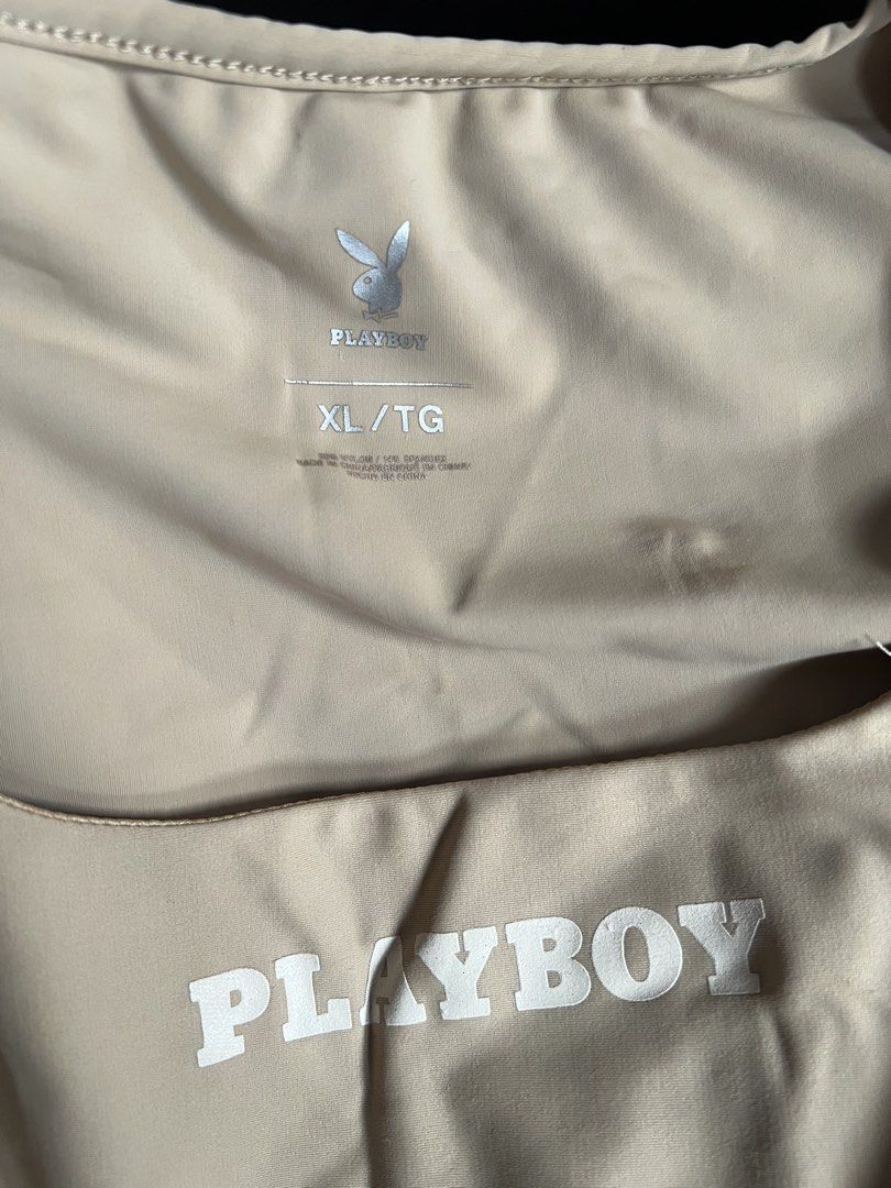 Playboy Ruched Crop Tops (2 Colors) (Category: Others Tops) located in Makati City. Submitted by annesexy (Listing ID 1450033141, Image 3). Description: - Set of 2 Playboy crop tops - Size: XL/TG - Colors: Tan/Beige and Light Sage Green - Features: Square neckline, ruched sides with adjustable ties - Material: Polyester and Spandex blend - Perfect for casual wear or workouts.
