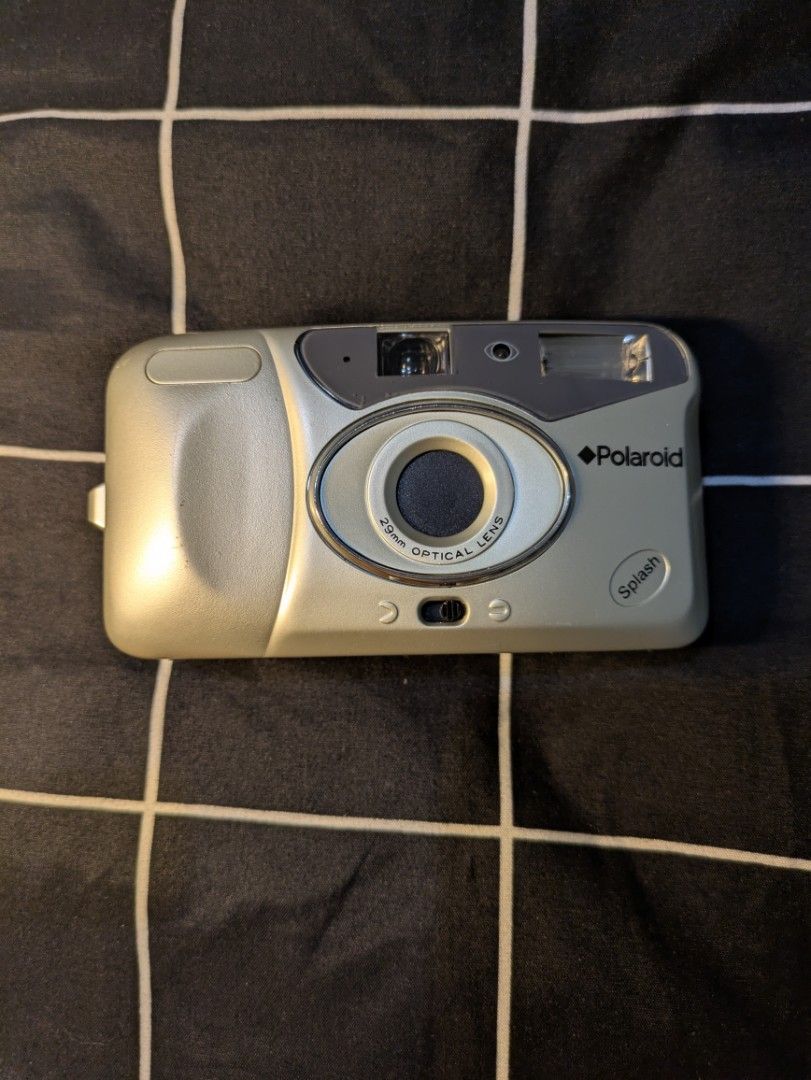 Polaroid Splash 35mm Film Camera (Category: Cameras) located in Quezon City. Submitted by stuff.decluttered (Listing ID 1450017264, Image 1). Description: 📷 [SECOND HAND] Polaroid Splash 29mm Optical Lens 💌 Price: ₱999 ✨ Battery-tested ✨ Dummy film-tested ✨ Shutter, flash, and film advance are all functional ✨ Body Cosmetics: 10/10 ✅ 29mm Fixed Optical Lens ✅ Built-in Flash ✅ Uses 35mm (135) Film ✅ Uses 2× AA batteries (not included) ✅ Compact 