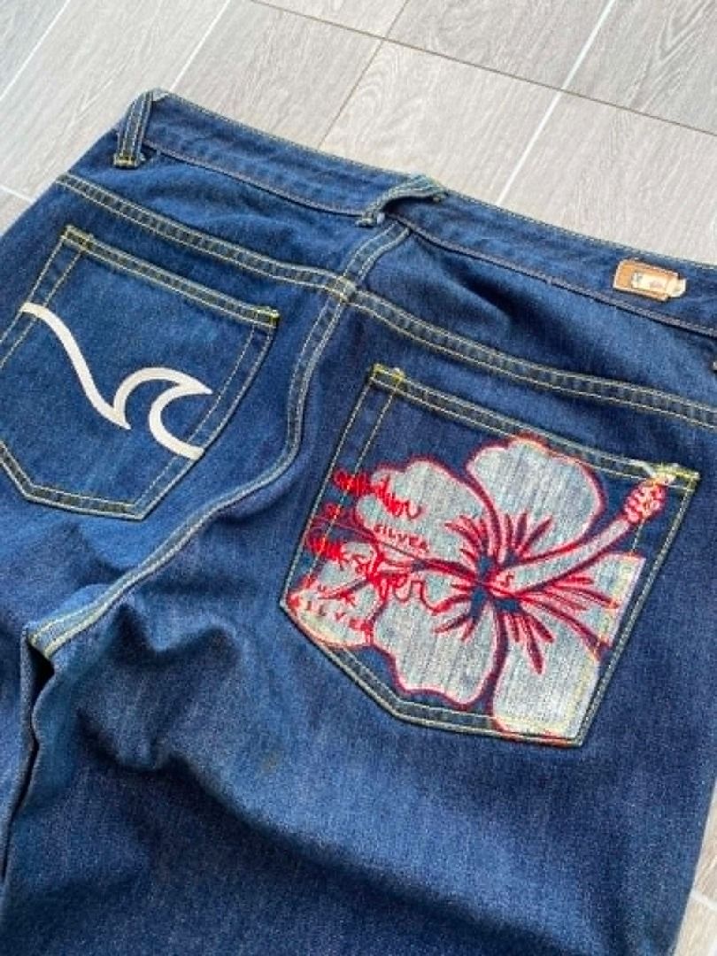 Quicksilver Pants (Category: Jeans) located in Orani. Submitted by yo.jo (Listing ID 1450013792, Image 3). Description: Quicksilver Pants "With Embroidered white wave and red/white hibiscus flower" Waist: 32 Length: 39 inch Inseam: 29 inch Hem: 9 inch .
