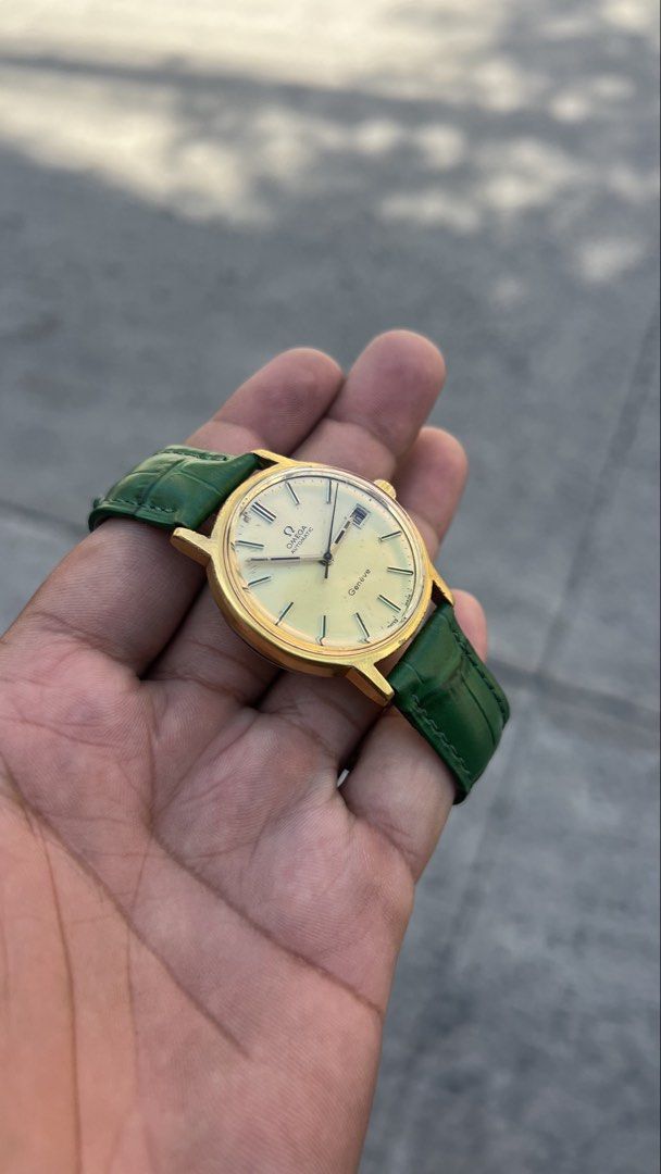 Rare Vintage Omega Geneve Automatic “Pine Gold” (Category: Luxury Watches) located in Caloocan City. Submitted by _alennchan (Listing ID 1450014765, Image 3). Description: Rare Vintage Omega Geneve Automatic “Pine Gold” - Cal 1481 - Condition: 9.6/10 - No issue - Emerald green Leather Strap - Original Omega Buckles - Case size approx 37mm including crown - Ref. 166.0098 - Automatic Movement - Comes with replacement box Inclusions: Replacement box