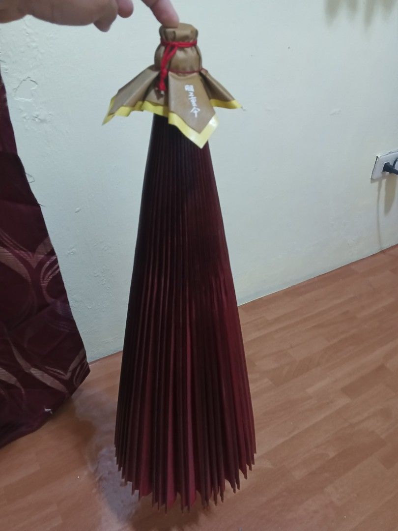 Red Paper Parasol Umbrella (Category: Umbrellas) located in Manila. Submitted by reascheyss51406 (Listing ID 1450053211, Image 2). Description: - Traditional red paper umbrella - Ideal for decoration or events - Features a sturdy wood handle - Folds neatly for convenient storage - Approximately 3 feet in diameter when open - A unique addition to any collection.