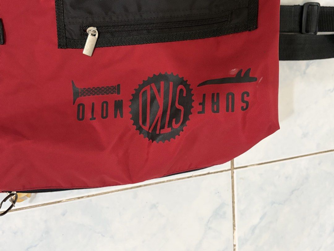 Red STOKED Surf Moto Bag (Category: Backpacks) located in Santa Rosa. Submitted by mm024 (Listing ID 1450077830, Image 2). Description: - STOKWS Surf Moto red bag - Front zippered pocket - Side mesh pocket - Adjustable strap with buckle closure - Interior zippered pocket - Perfect for carrying your gear - 1 Strap backpack Price 250 Delivery shouldered by buyer .